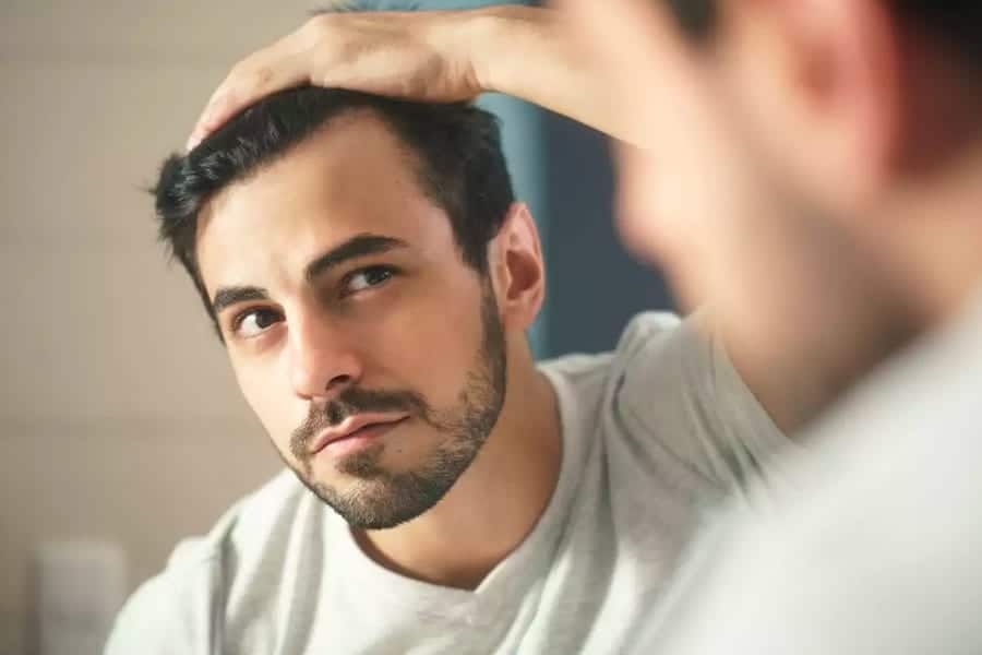 calvitie homme the clinic bruxelles expert implant traitement capillaire greffe de cheveux medecine esthetique belgique