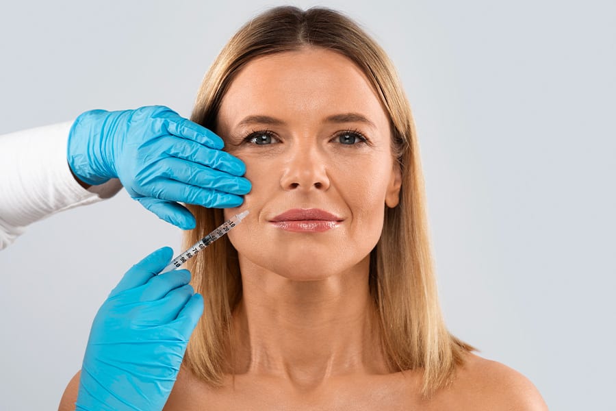 injections acide hyaluronique sillons nasogeniens visage the clinic bruxelles expert medecine esthetique belgique greffe de cheveux belgique