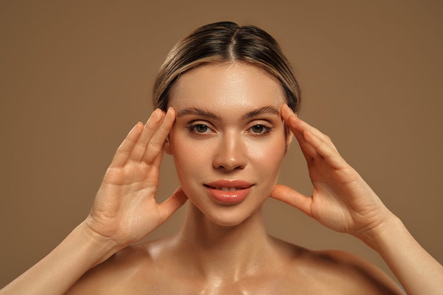 injections acide hyaluronique tempes visage the clinic bruxelles expert medecine esthetique belgique greffe de cheveux belgique